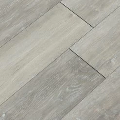 Home Decorators Collection Baneberry Oak 7 In. X 42 In. Rigid Core Luxury Vinyl Plank Flooring (20.8 Sq. Ft. / Case) -Carpet And Flooring Stores 9a441e71921e294443759047f8c4b425 1800x1800