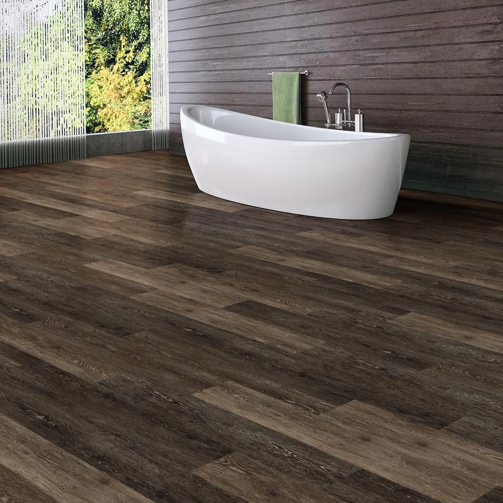 TrafficMaster Khaki Oak Dark 6 in. W x 36 in. L Luxury Vinyl Plank Flooring (24 sq. ft. / case) TrafficMaster Khaki Oak Dark 6 In. W X 36 In. L Luxury Vinyl Plank Flooring (24 Sq. Ft. / Case) -Carpet And Flooring Stores