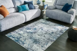 Putmins 5' X 7' Rug Signature Design By Ashley Contemporary Area Rugs Putmins 5' X 7' Rug -Carpet And Flooring Stores c8c98c23de66486a9ec65ef998de477a 1